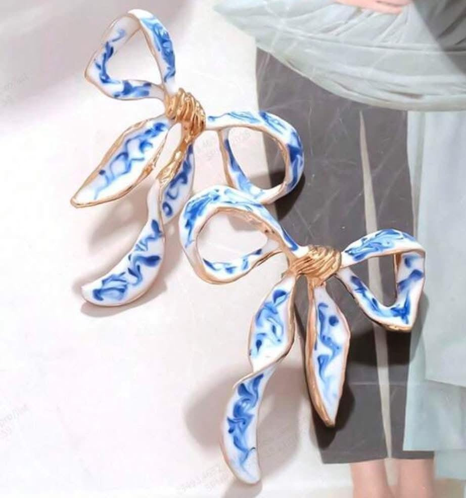 Blue and white bow earrings