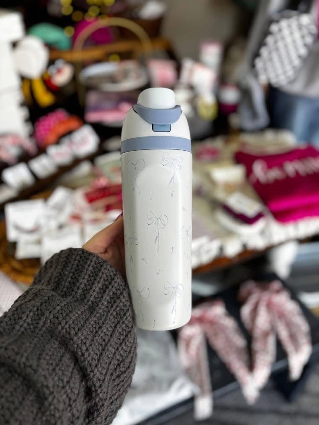 White bow bottle