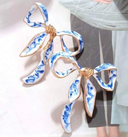 Blue and white bow earrings